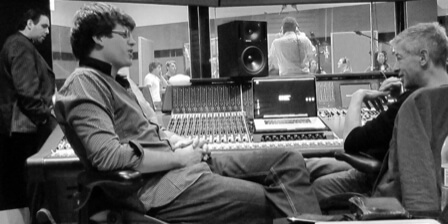 men sitting in recording studio